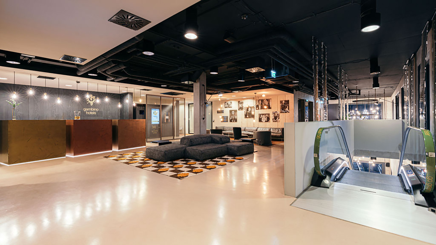 Hotel lobby with the reception desk and lounge seating